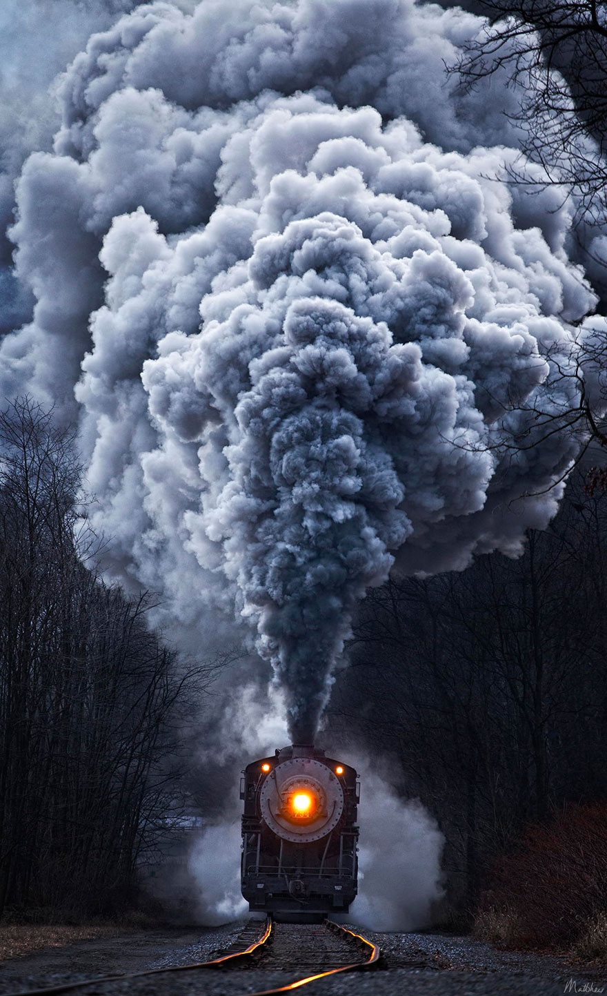 Train with large smokestack.